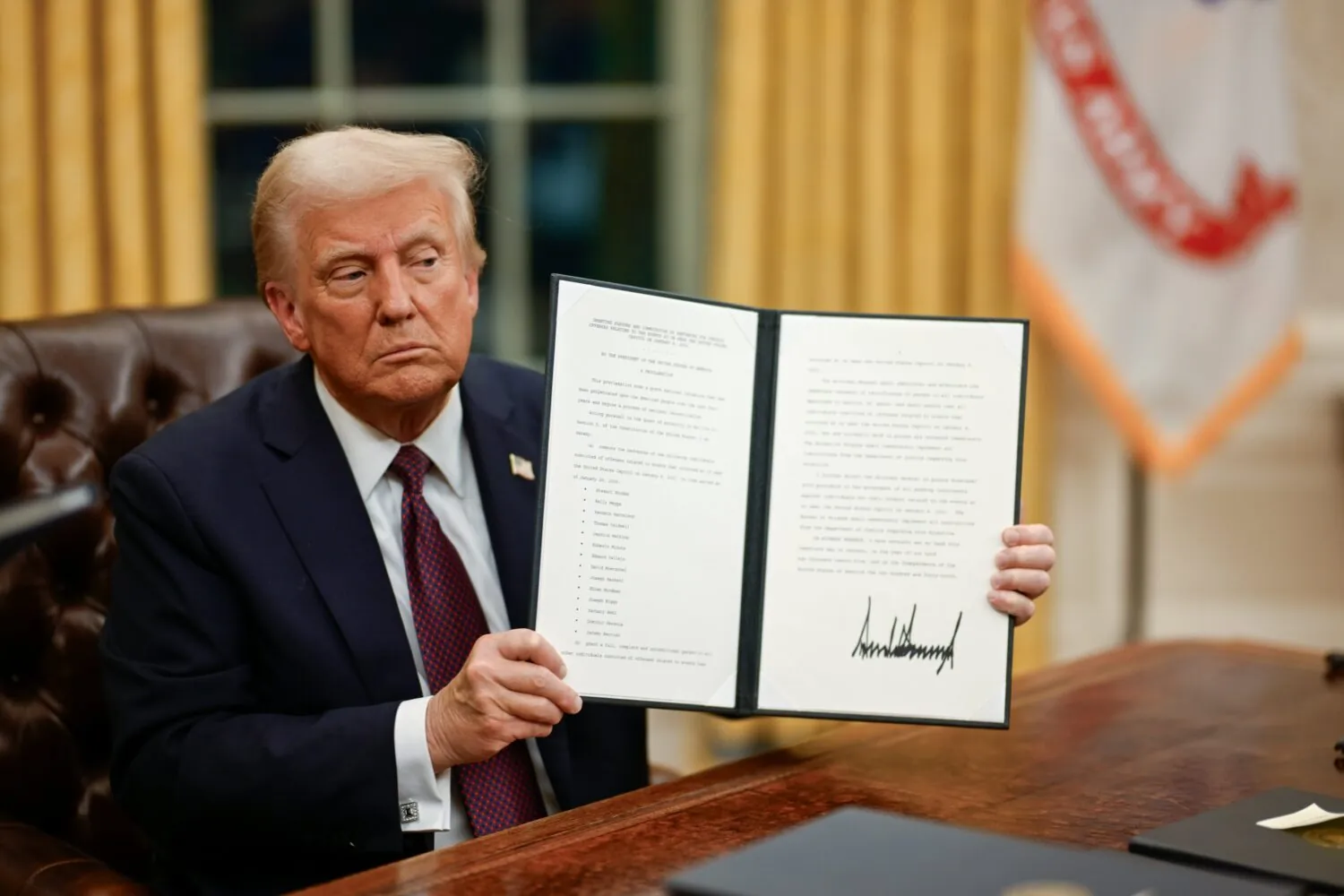 President Donald Trump signing executive orders
